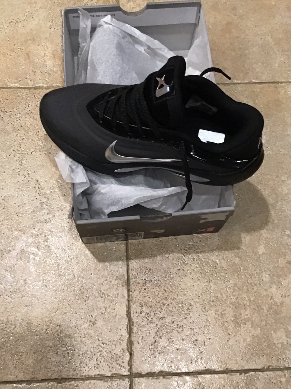 Nike Black Sneaker with Silver Swoosh